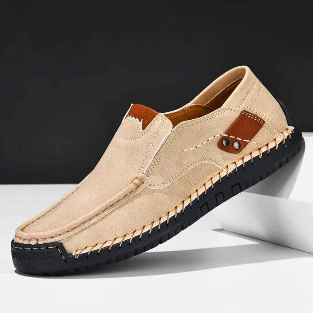 Men's comfortable black slip-on shoes with arch support for daily wear. Ideal casual and walking footwear.