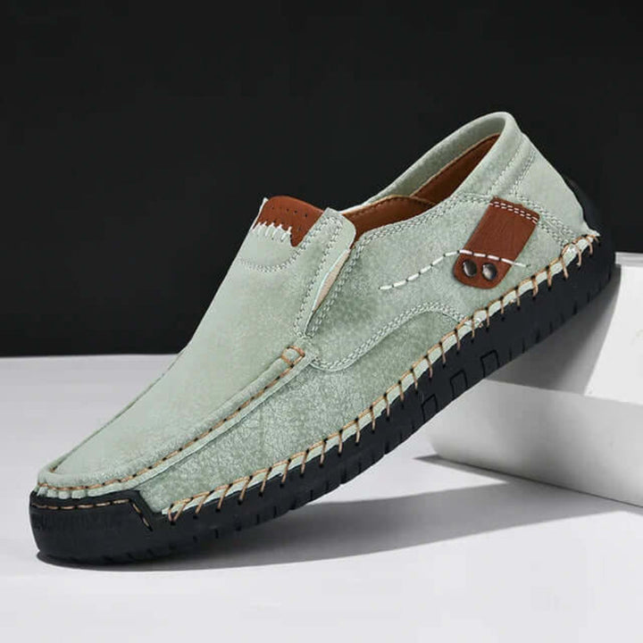 Lightweight men's slip-on footwear, featuring cushioned comfort and arch support for active or casual use.