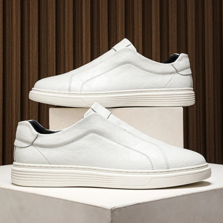 Comfortable men's leather slip-on shoes, offering easy on/off convenience for any casual occasion.