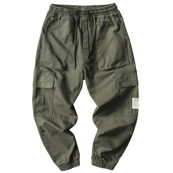 Modern men's casual tapered joggers featuring an elastic waist and drawstring for a secure fit.
