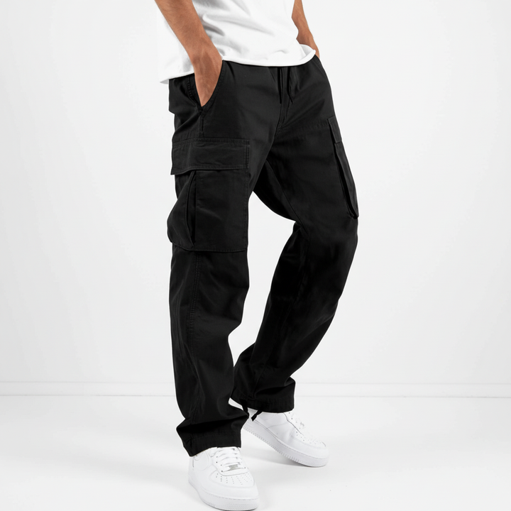 Front view of men's cotton cargo joggers with elastic waist and ankle cuffs for comfort.
