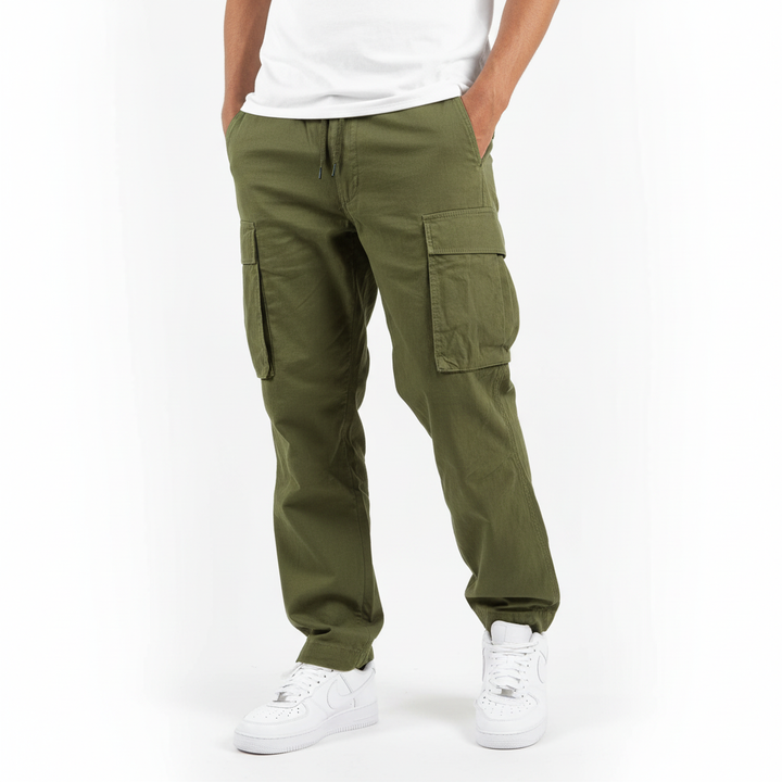 Model wearing men's relaxed fit cotton cargo joggers, showcasing their comfortable design.