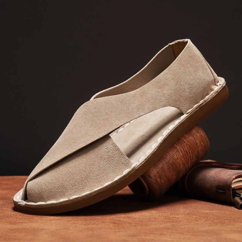 Men's comfortable cross-strap flat sandals for casual summer wear. Slip-on open-toe design, perfect for beach & everyday.