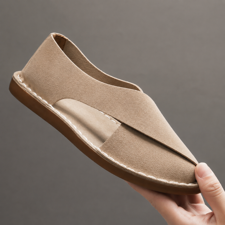 Comfortable men's slip-on flat sandals with cross-straps. Open-toe design ensures breathability for summer & beach.
