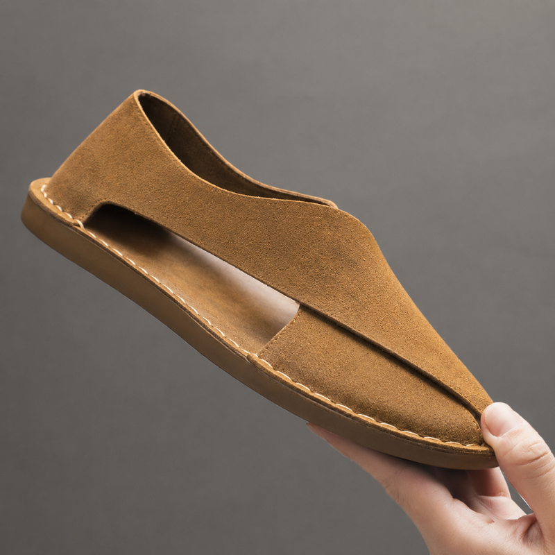 Versatile men's cross-strap flat sandals. Comfortable slip-on open-toe shoes for beach, vacation, and everyday summer style.