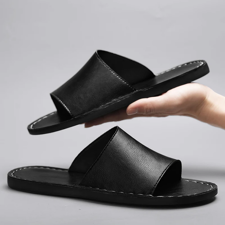 Ultimate comfort men's cross-strap sandals, essential open-toe footwear for summer walks and beach.