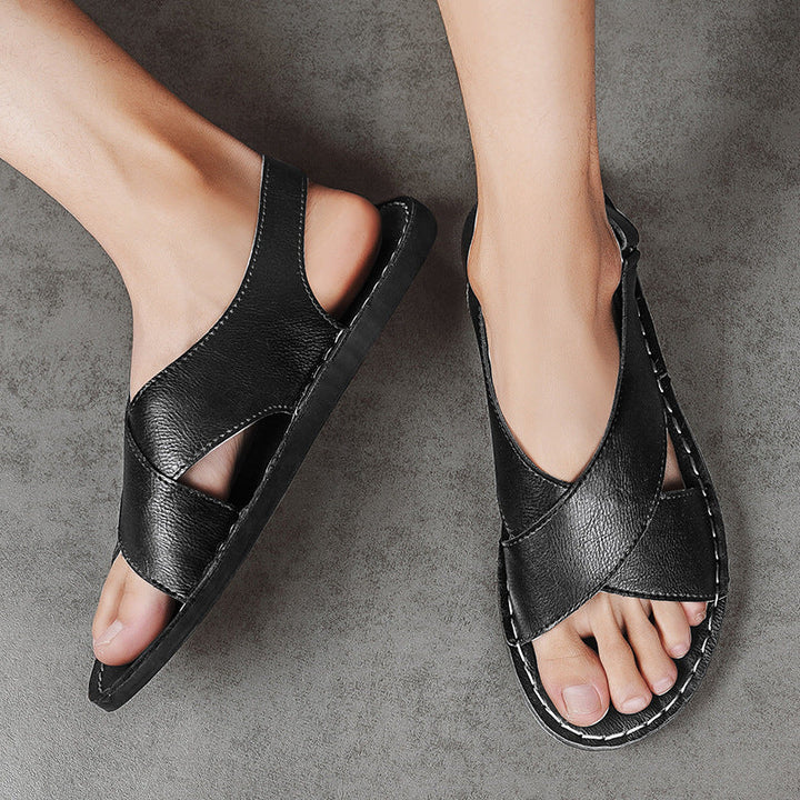 Men's comfortable cross-wrap slip-on sandals with a flat sole, perfect for casual summer beach vacation.