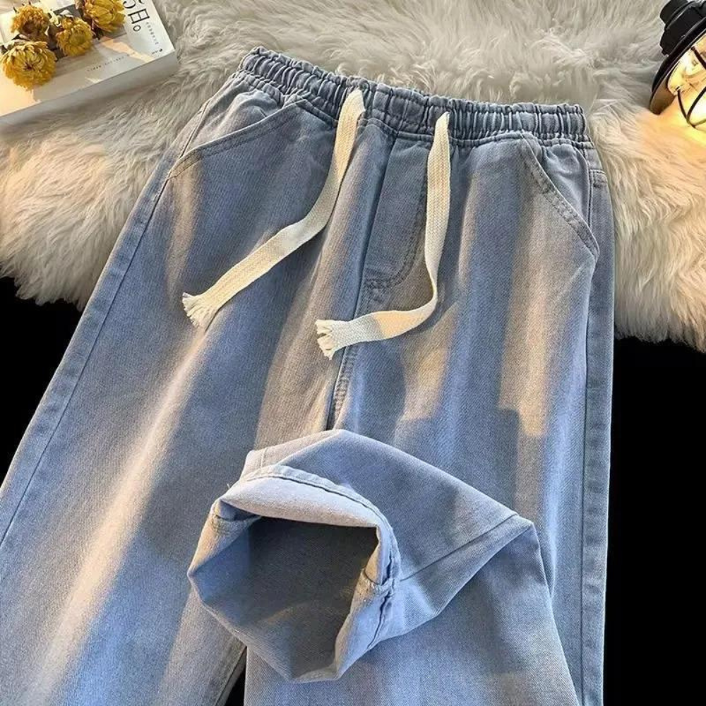 Men's comfortable denim jogger pants with elastic waist & drawstring, perfect for casual wear & streetwear.
