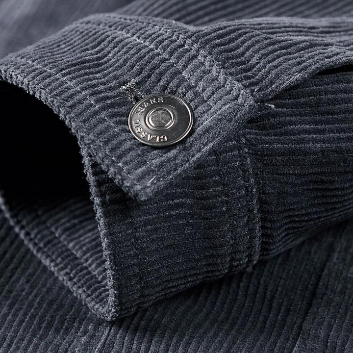 Comfortable men's grey corduroy outerwear, perfect for layering during cooler fall days.