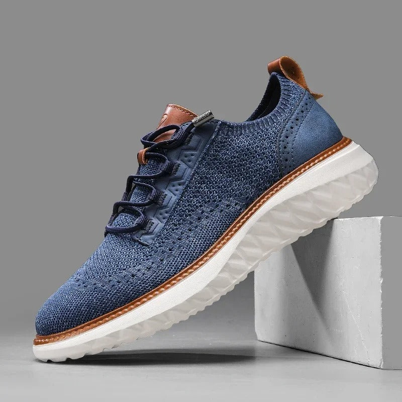 Flexible blue men's casual knit shoes, designed for all-day comfort & style.
