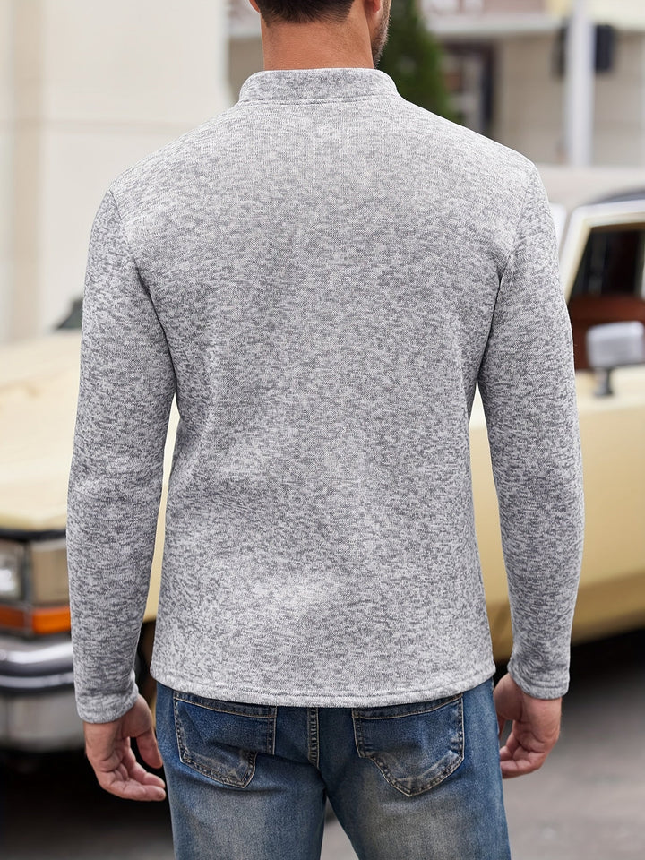 Stylish black men's long sleeve shirt, versatile for casual wear. Features a stand collar and chest pocket.