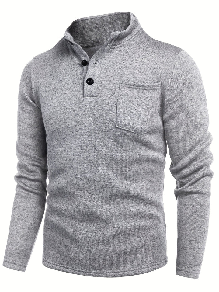 Light grey men's long sleeve top, essential for everyday comfort. Features a stand collar and practical chest pocket.