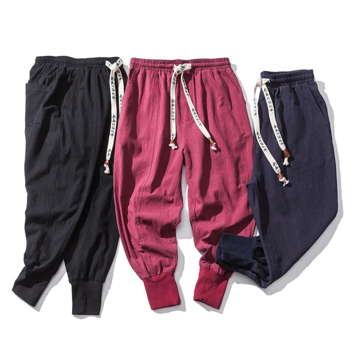 Men's comfy linen blend joggers with an elastic waist, embodying modern street style and athletic fashion.