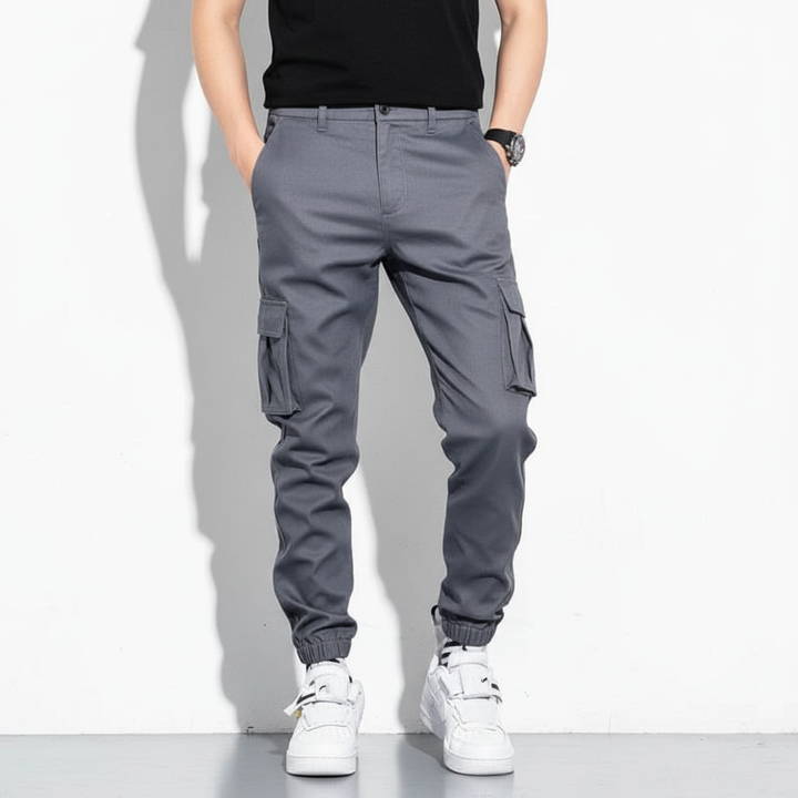 Comfortable men's khaki cargo trousers feature ample storage with practical multi-pockets.