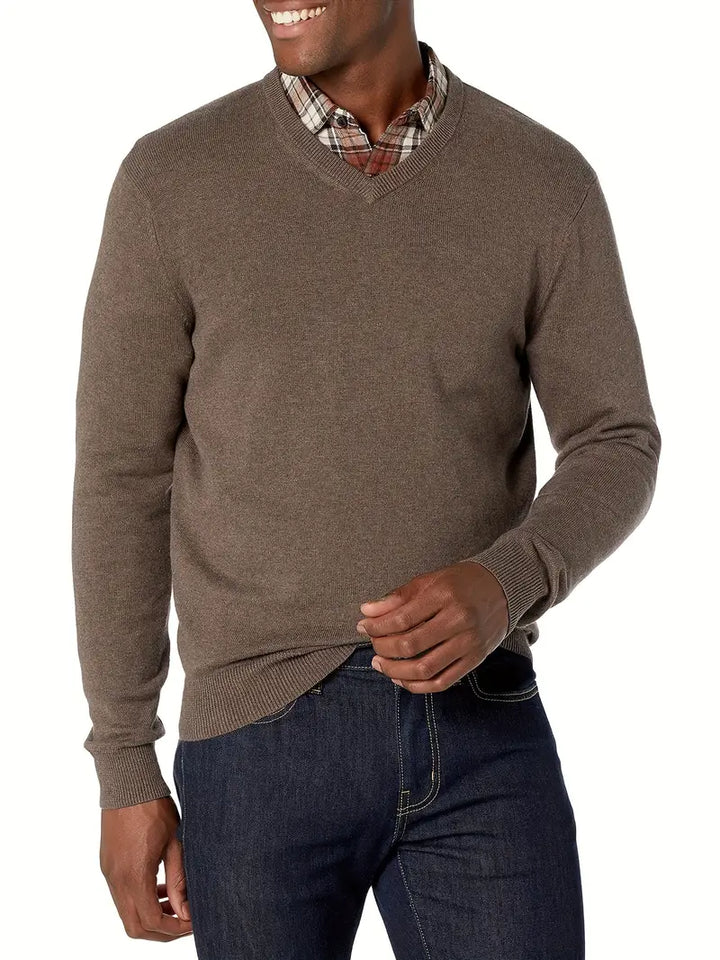 Men's classic round neck long sleeve knitted sweater. Refined comfort for any occasion.