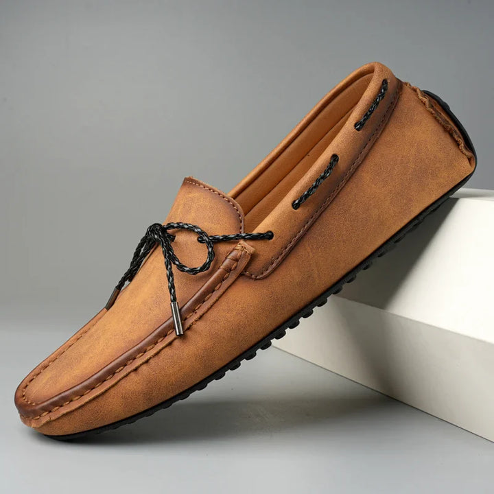 Men's comfortable slip-on loafers for dress or casual wear, featuring a timeless design.
