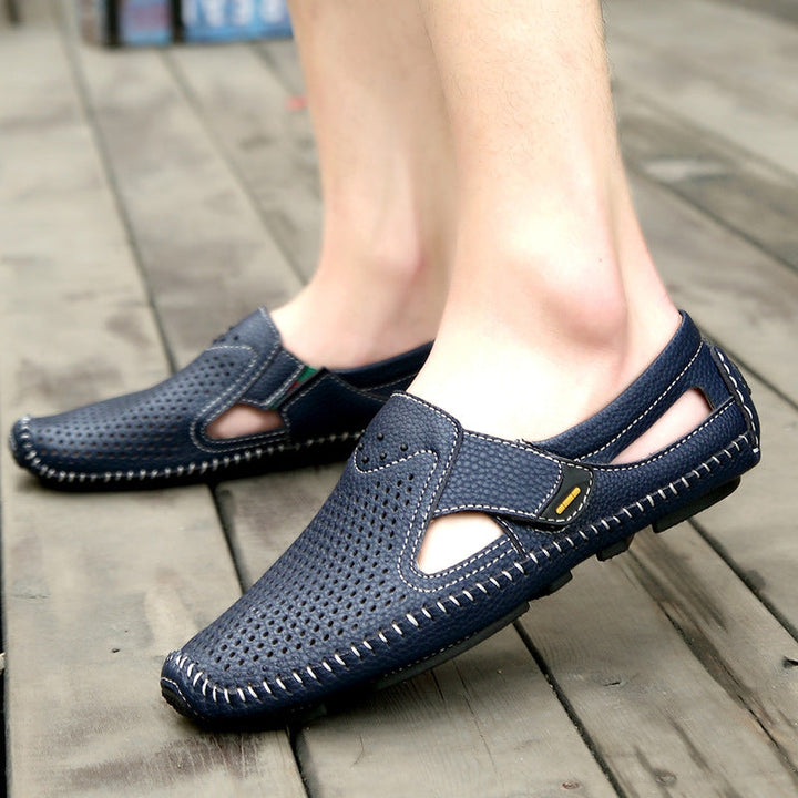 Perforated men's driving loafers, comfortable slip-on shoes for optimal breathability.