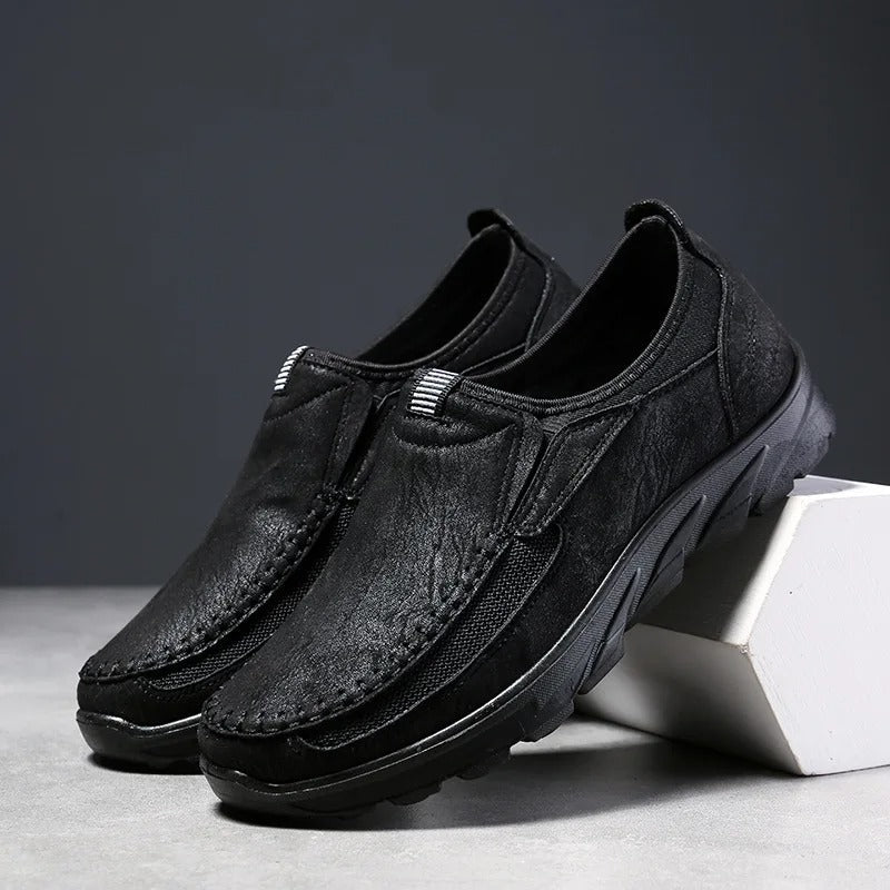 Top view: Breathable men's slip-on loafers with cushioned insole, perfect for comfortable daily wear.