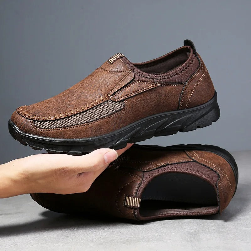 Durable men's walking loafers with cushioned sole, comfortable slip-ons for all-day everyday wear.