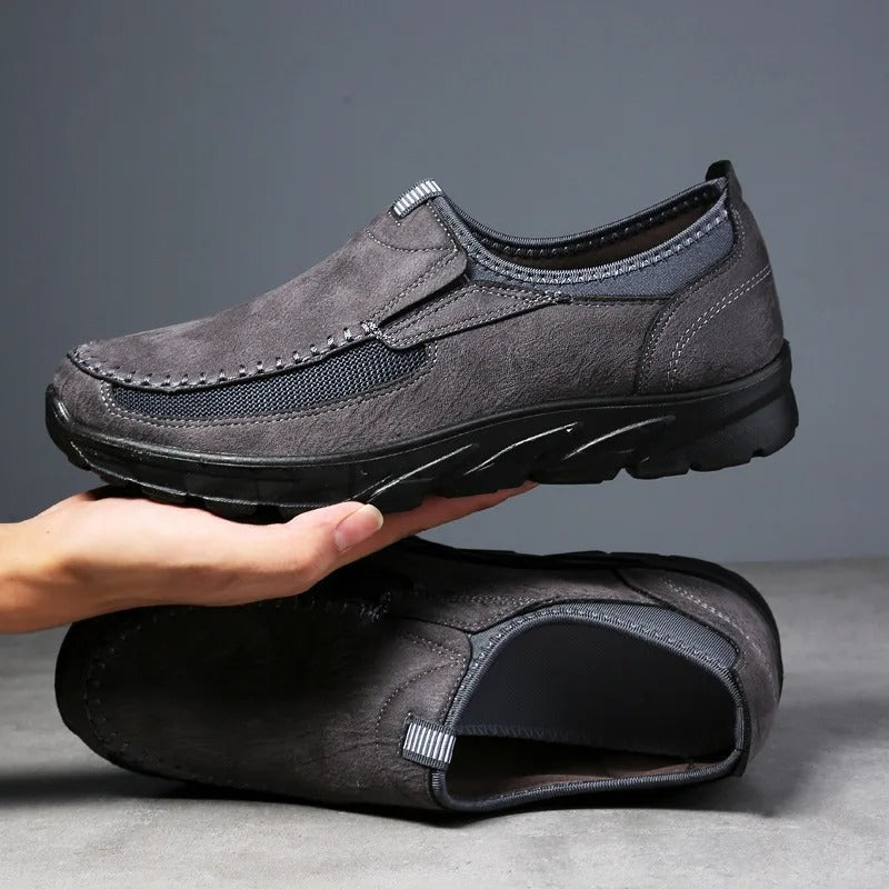 Navy blue men's comfortable slip-on loafers, durable and casual for everyday walking.