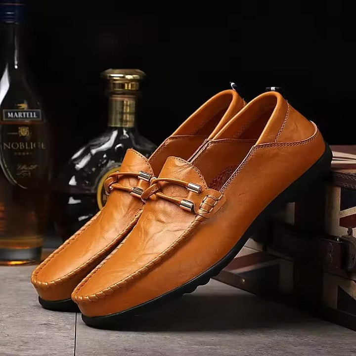 Elegant camel men's slip-on loafers, ideal for casual or dressy occasions.