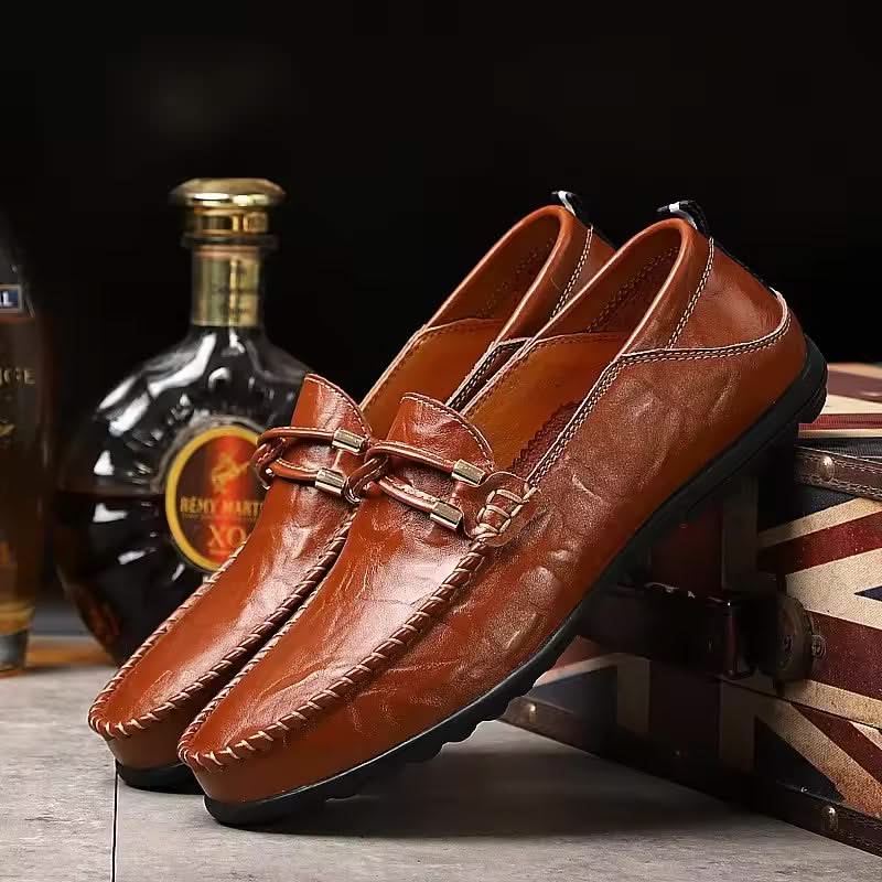 Brown men's comfortable slip-on loafers for versatile everyday and office wear.