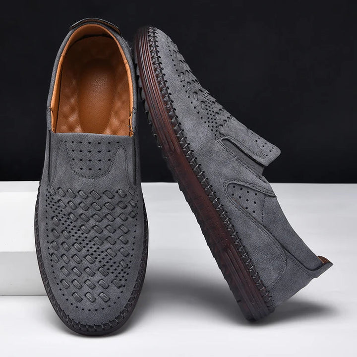 Perforated men's slip-on loafers ensure breathable comfort. Stylish casual shoes for everyday wear.