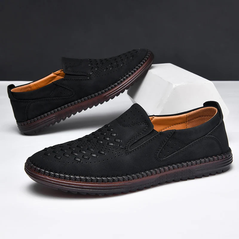 Perforated men's slip-on walking shoes. Breathable and cushioned loafers for comfortable everyday wear.