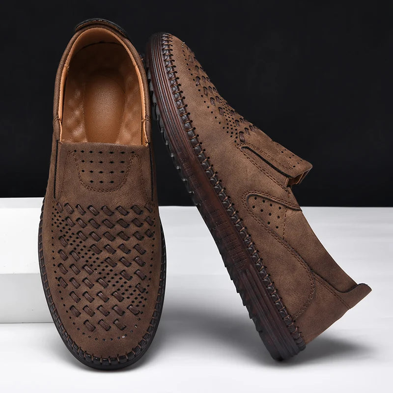 Perforated men's loafers, offering breathable and comfortable slip-on footwear. Ideal for casual wear.