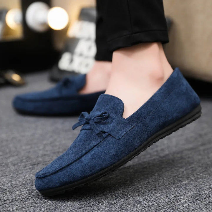 Men's comfortable slip-on loafers with stylish bow, perfect for casual or polished looks.