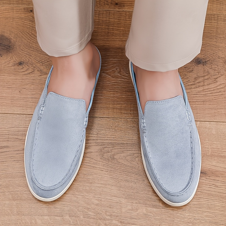 Man wearing comfortable slip-on mule loafers, showcasing casual and stylish everyday men's footwear.