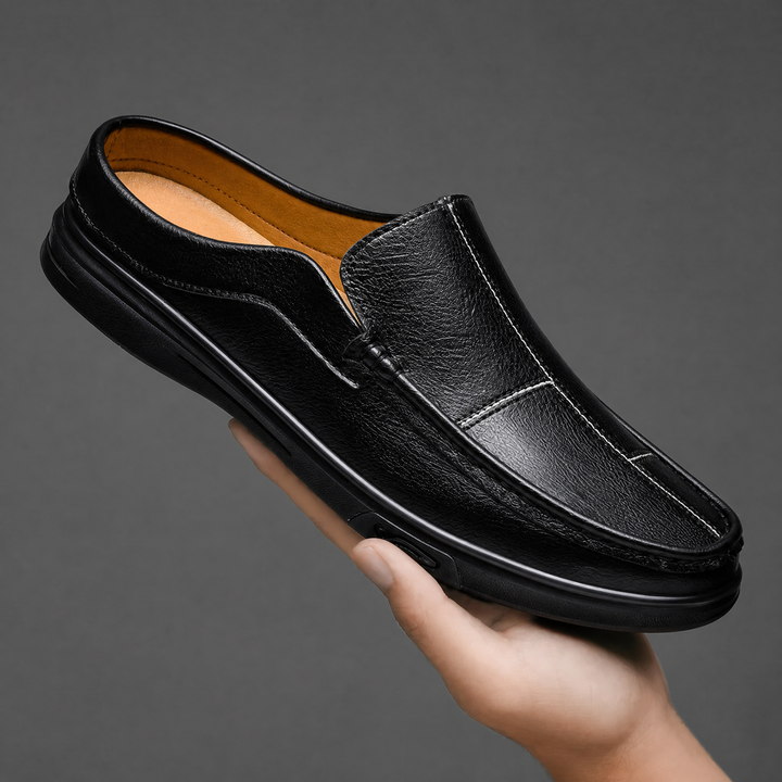 Stylish men's comfort mules; versatile slip-on shoes ideal for casual everyday footwear and relaxation.