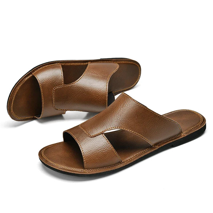 Anti-slip men's summer slip-on sandals, secure and comfortable for warm weather activities.