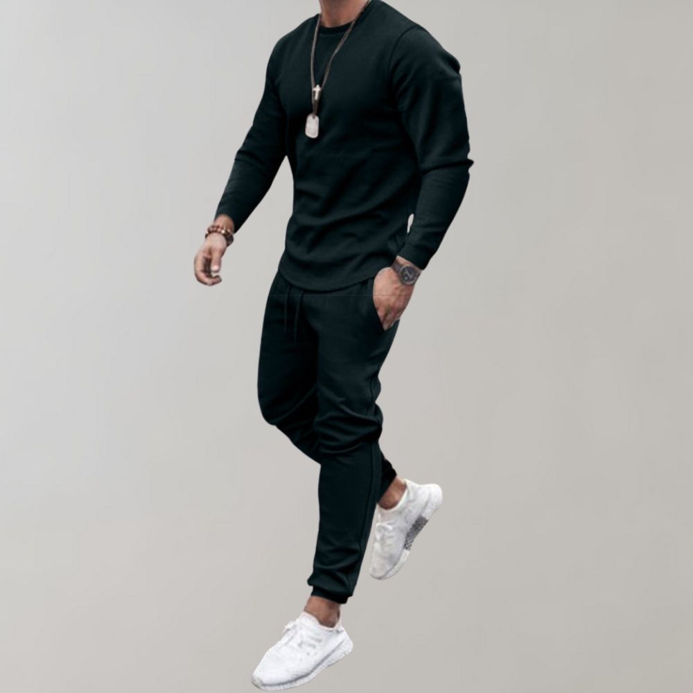 Polyester men's tracksuit set, offering comfort & style. Great for workouts, casual wear, or a relaxed sporty look.