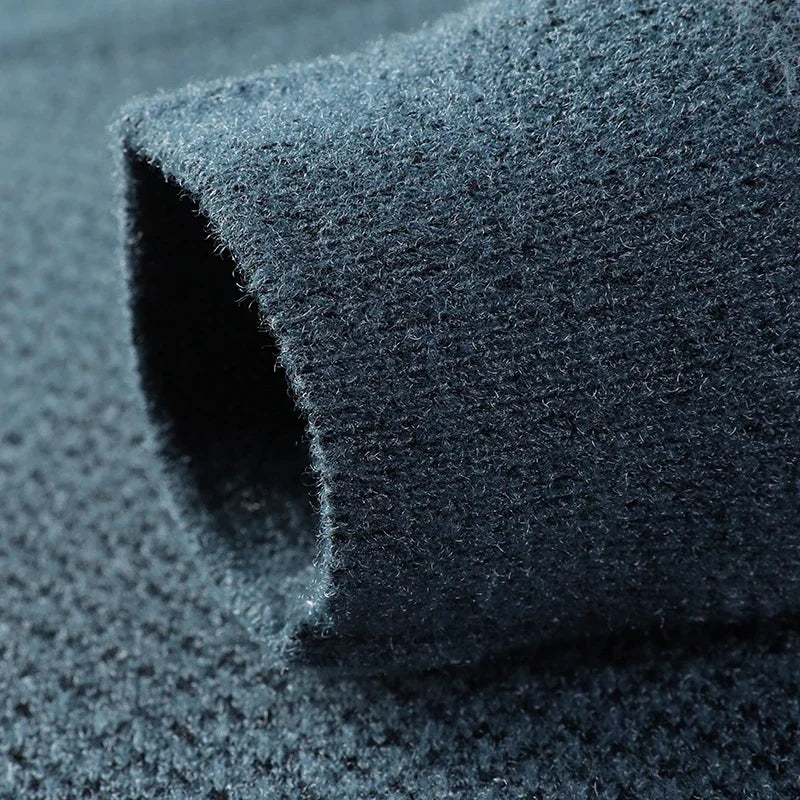Men's long-sleeve textured knit sweater, blending warmth, breathability, and versatile style for casual fashion.