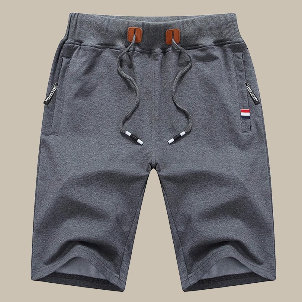 Comfortable men's summer shorts, versatile for active wear or casual lounge, with a practical drawstring.