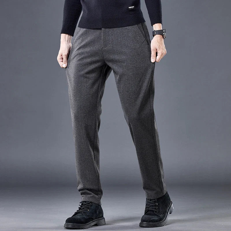Gray men's contour fit dress pants, tailored for comfort & wrinkle-free professional workwear.