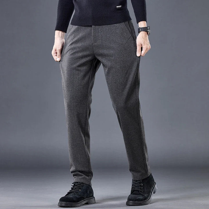 Gray men's contour fit dress pants, tailored for comfort & wrinkle-free professional workwear.