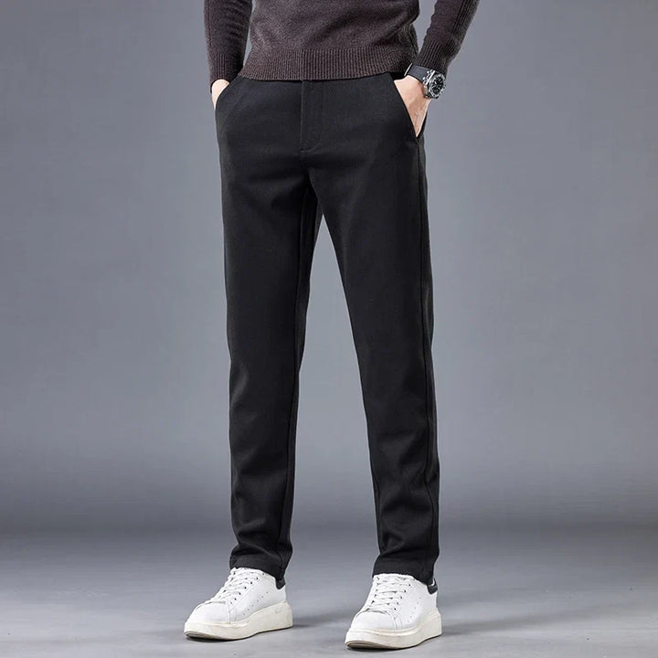 Black men's contour fit stretch pants, ideal for casual or tailored workwear, wrinkle-free style.