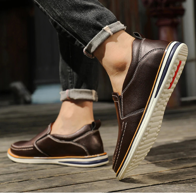 Stylish Cooper Mocs loafers complementing a dress casual outfit with a blazer, modern men's fashion.