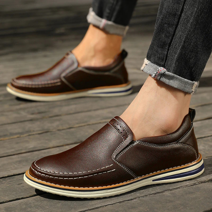 Men's Cooper Mocs loafers paired with chinos, ideal for a smart casual look & versatile fashion. Everyday style.