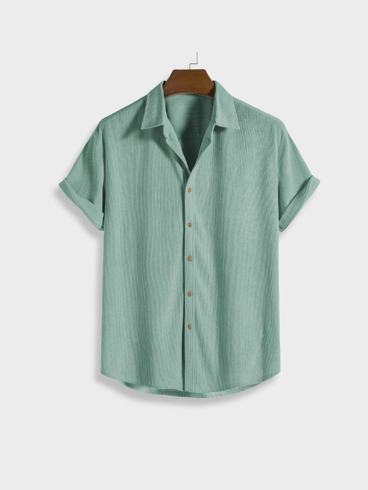 Relaxed fit men's corduroy summer set, featuring a button-up shirt and comfortable shorts.