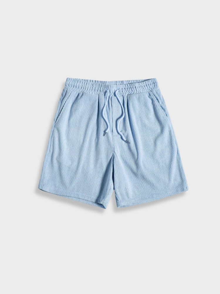 Breathable men's corduroy summer set. Comfortable button-up shirt and shorts, perfect for hot weather.