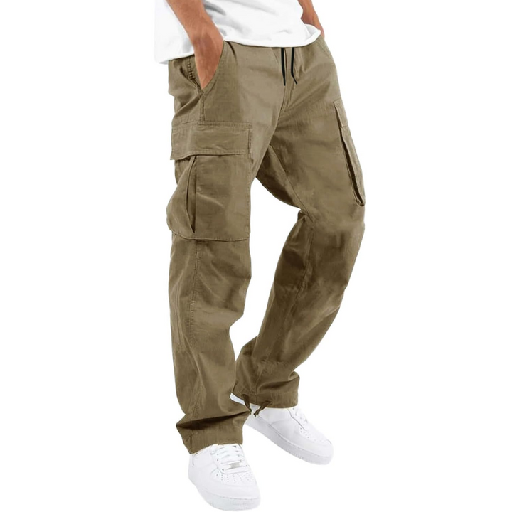 Full-body shot of men's cotton cargo joggers, showcasing their modern, tapered leg