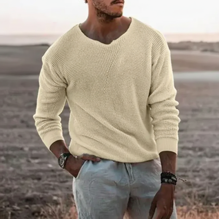 Close-up of a men's knit sweater showcasing the cozy texture, Joseph brand, perfect for winter
