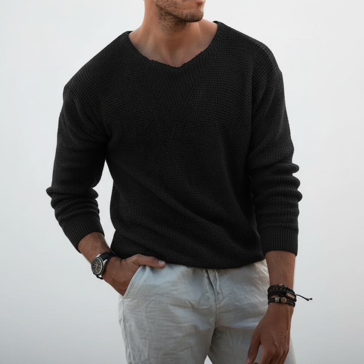 Men model wearing a comfortable Joseph long sleeve knit sweater, highlighting its warmth and fit