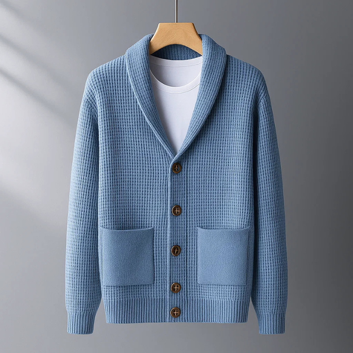 Men's cozy button-up cardigan sweater in a versatile color, perfect for layering and casual fall/winter fashion.