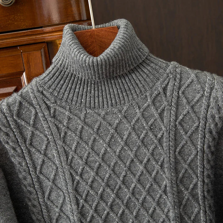 Textured men's cable knit turtleneck, soft and cozy. Essential warm sweater for winter fashion.
