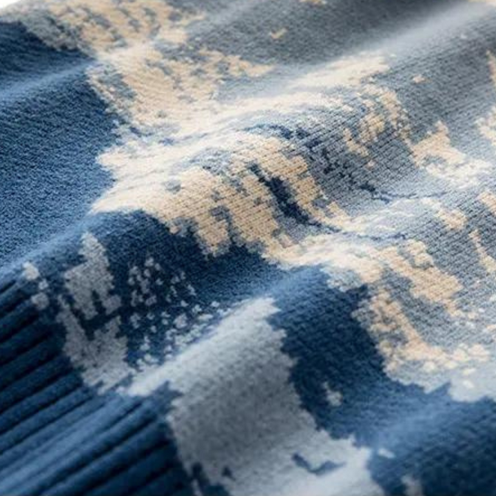 Nordin men's casual knit sweater with a distinctive mountain pattern, providing warmth for cold weather.
