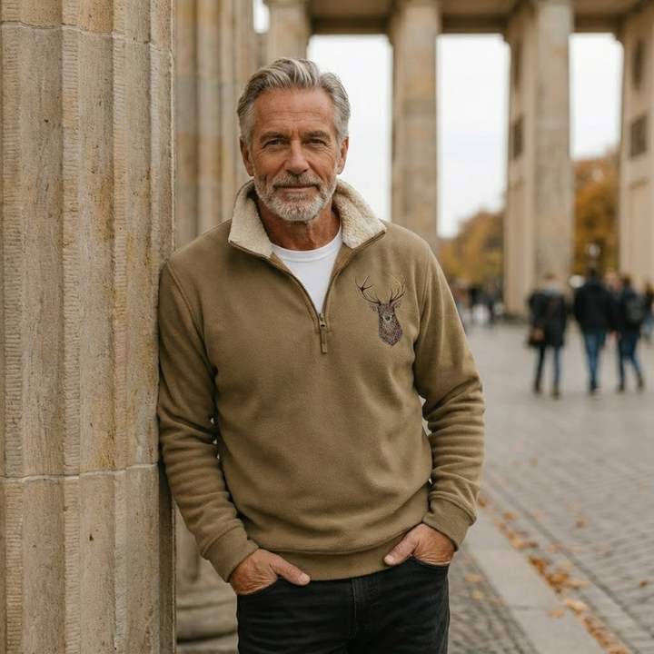 Men's cozy Nordic deer sweater with zip collar & elbow patches. Perfect for warm, stylish fall/winter outdoor wear.